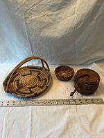 All three baskets with ruler for scale
