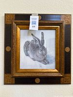 Front view of framed Dürer "Young Hare" print showing frame design and artwork