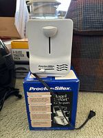 Proctor Silex two-slice toaster on its original box