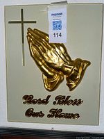 Front view of plaque showing design and text