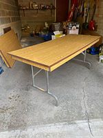 Table unfolded showing full top and legs