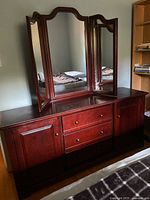 Front view of dresser with tri-panel mirror attached
