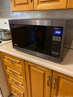 Front view of Panasonic microwave on countertop