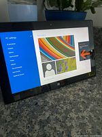 Tablet powered on displaying Windows RT system settings screen