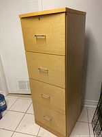 Front view of tall four-drawer file cabinet