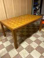 Full view of rectangular wood inlay dining table