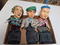 Three vinyl-head Three Stooges golf club covers in box