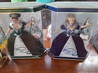 Millennium Princess Teresa and Millennium Princess Barbie boxed dolls side by side