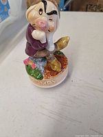 Front view of Grumpy porcelain music box