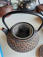 Top view of teapot showing interior stainless steel infuser basket