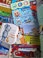 Board books, plush toy and assorted items