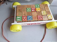 Top view of wagon loaded with alphabet blocks