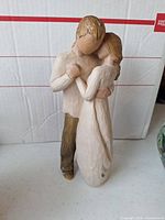 Front view of Willow Tree couple figurine