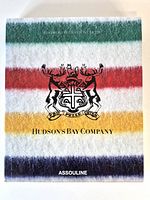 Front cover showing title, crest, and multicolour stripe design