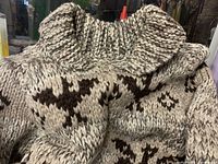 Ribbed shawl collar and shoulder area of the natural and brown wool Cowichan sweater