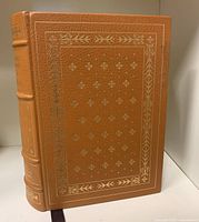 Front board showing full leather and gilt design