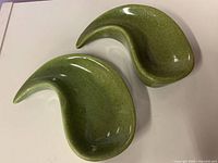 Top view of both green biomorphic dishes