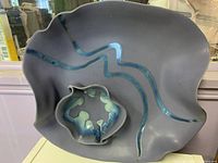 Top view of Hilborn pottery platter with dip bowl showing glaze design and shape