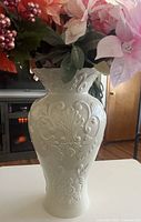 Full view of ivory Lenox vase showing embossed design