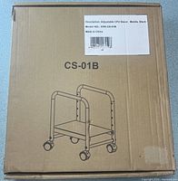 Front of sealed carton with model label and outline drawing of stand