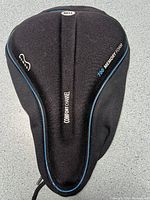 Top view shows Bell branding, comfort channel design and blue piping