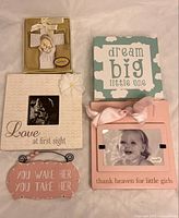 All five nursery décor items grouped