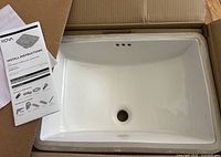 Sink in box with instruction manual