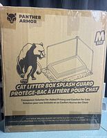Front of sealed retail box showing Panther Armor cat litter box splash guard, size M