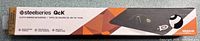 Front of boxed SteelSeries QcK mousepad