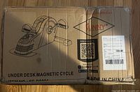 Sealed cardboard box showing product image, brand, model and labeling