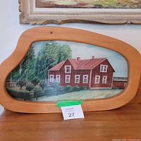 Front view of oil painting in unique wood frame