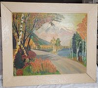 Full view of framed mountain landscape painting