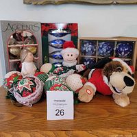 Overall lot showing handmade ornaments, boxed glass ornaments, plush toys, angel figurine