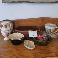 Full lot showing two vases, two bowls, soapstone dish, mug with saucer, Ukrainian eggs