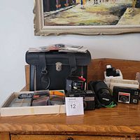 Group shot showing bag, cameras, slides, filters