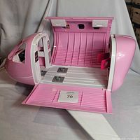 Fuselage open showing interior cabin and missing tail wing