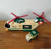 Helicopter and truck side view on surface