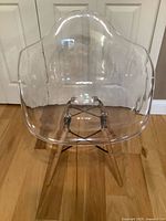 Front view transparent lucite armchair wood legs