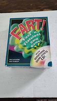 Front of boxed Fart! card game