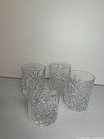Four cut crystal rocks glasses front view