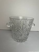 front view of ice bucket highlighting cut pattern and handles