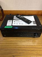 Receiver with remote and manual on top