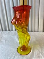 Front view of Amberina female torso vase showing gradient and form