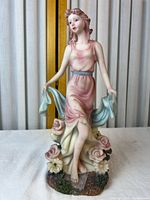 Front view of porcelain figurine showing overall design