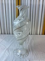 Full view of swirled glass vase