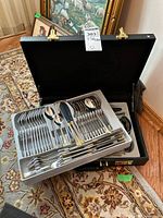 Overall view of flatware organizers in black case