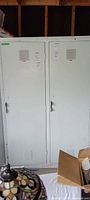 Front view of two-door metal locker cabinet