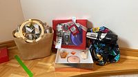 All items together: Lancome sets, toiletry basket, Conair hair dryer