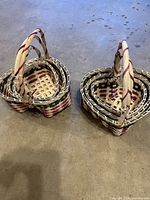 Two stacks of nested heart-shaped baskets showing overall lot