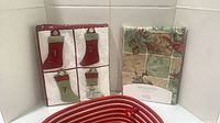 Advent calendar package, tablecloth package, top edge of rope basket visible
